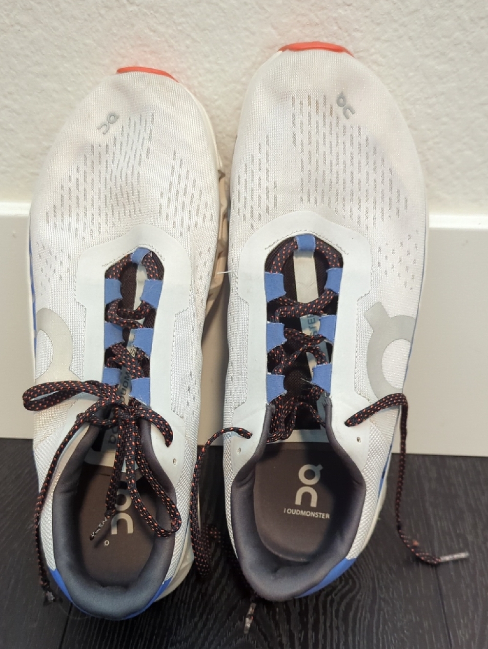 On Cloudrunning Men’s White Athletic Shoes with Blue Accents